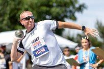U.S. Army Sgt. 1st Class Jeffery Peters puts the shot in the field event during the 2025 Department of Defense Warrior Games at Colorado Springs, Colorado, July 22, 2025.