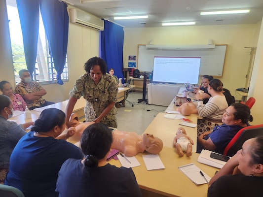 Cmdr. Christina Carter, a Navy public health nurse currently serving as the Director for Public Health at Naval Hospital Twentynine Palms and Navy Medicine Readiness and Training Command Twentynine Palms, teaches a Basic Life Support class in the Kingdom of Tonga, as part of Pacific Partnership 2025. Pacific Partnership is the U.S. Navy’s largest annual humanitarian mission, aimed at strengthening disaster response capabilities, building relationships with host nations, and improving health outcomes through education and collaboration (U.S. Navy Courtesy Photo).