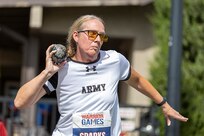 U.S. Army Maj. Amy Sparks puts the shot in the field event during the 2025 Department of Defense Warrior Games at Colorado Springs, Colorado, July 22, 2025.