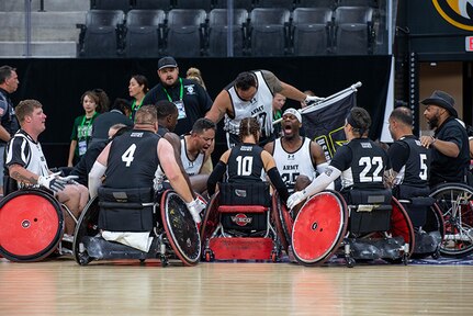Team Army huddles during the wheelchair rugby event at the 2025 Department of Defense Warrior Games at Ed Robson Arena in Colorado Springs, Colorado, July 22, 2025.