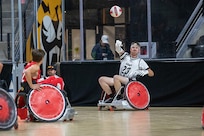 U.S. Army Staff Sgt. Coty Tuck passes the ball down court in a wheelchair rugby match during the 2025 Department of Defense Warrior Games at Ed Robson Arena, Colorado Springs, Colorado, July 22, 2025.
