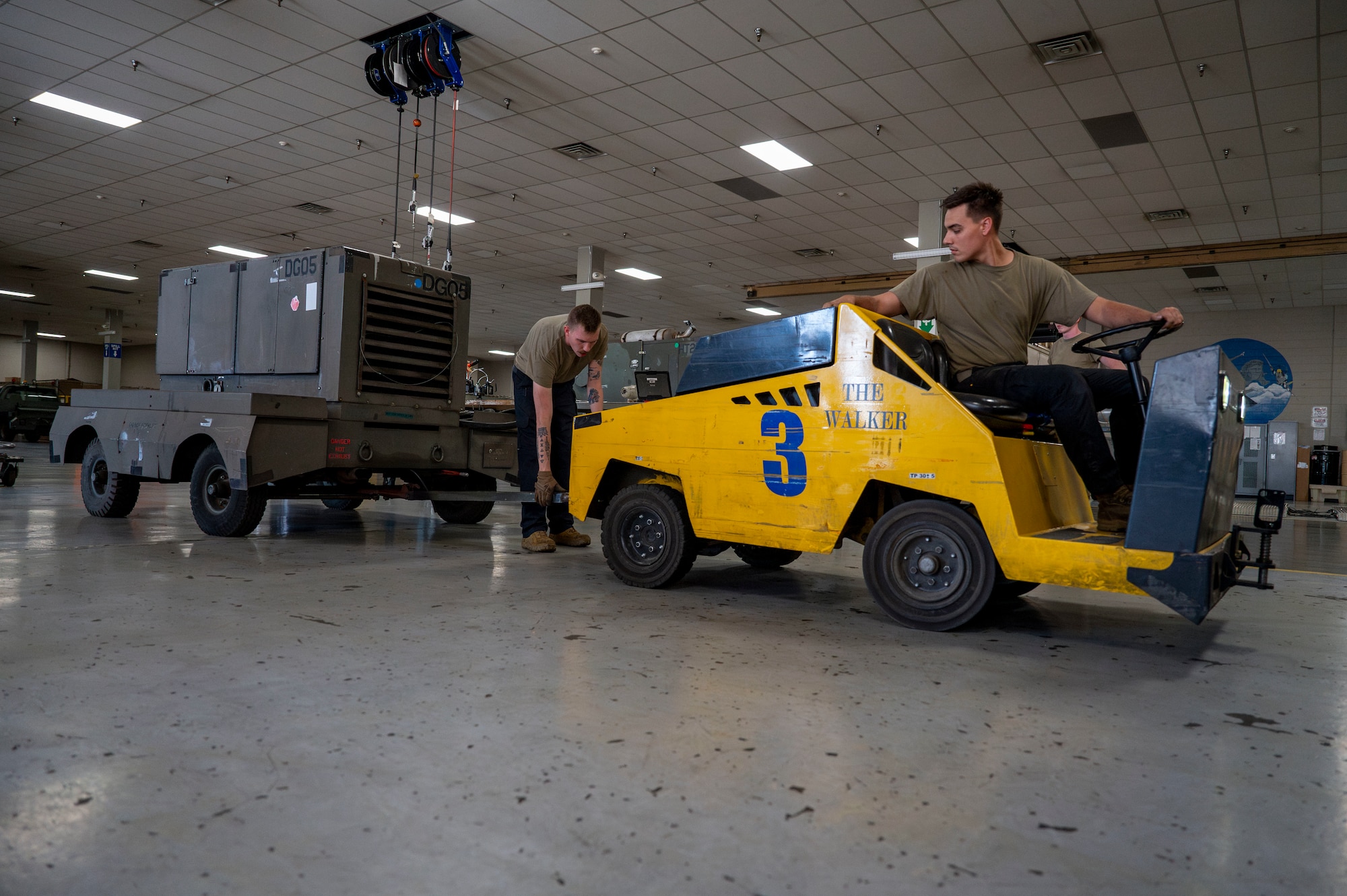 Airmen haul power bank.