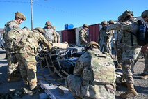 A group of 9th Civil Engineer Squadron Airmen palletize cargo during an exercise on Beale Air Force Base, California, July 17, 2025.