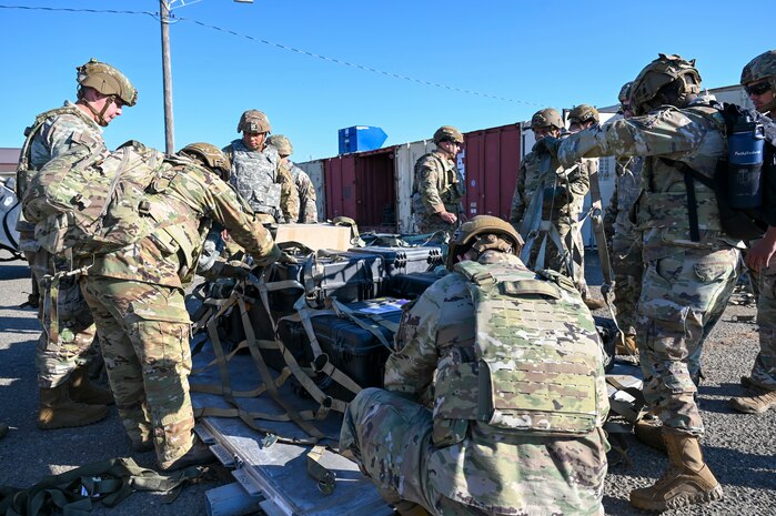 A group of 9th Civil Engineer Squadron Airmen palletize cargo during an exercise on Beale Air Force Base, California, July 17, 2025.