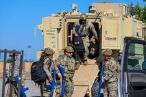 U.S. Air Force 9th Civil engineer Airmen step out of a vehicle during an exercise on Beale Air Force Base, California, July 17, 2025.