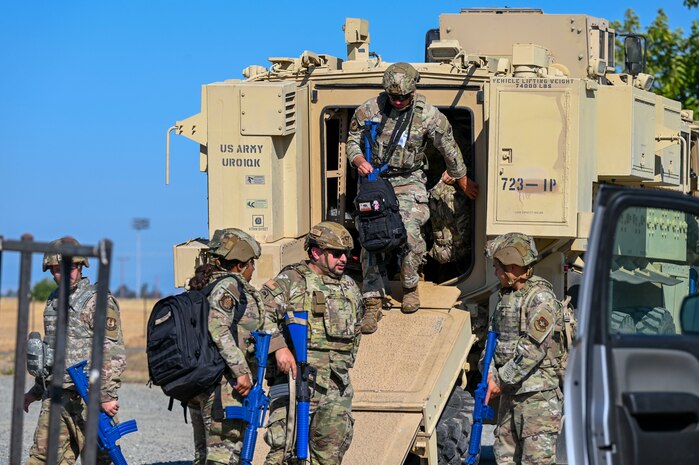 U.S. Air Force 9th Civil engineer Airmen step out of a vehicle during an exercise on Beale Air Force Base, California, July 17, 2025.
