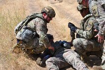 9th Civil Engineer Squadron Airmen respond to a tactical combat casualty care (TCCC) scenario during an exercise on Beale Air Force Base, California, July 17, 2025.