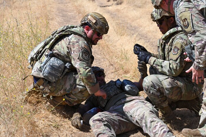 9th Civil Engineer Squadron Airmen respond to a tactical combat casualty care (TCCC) scenario during an exercise on Beale Air Force Base, California, July 17, 2025.