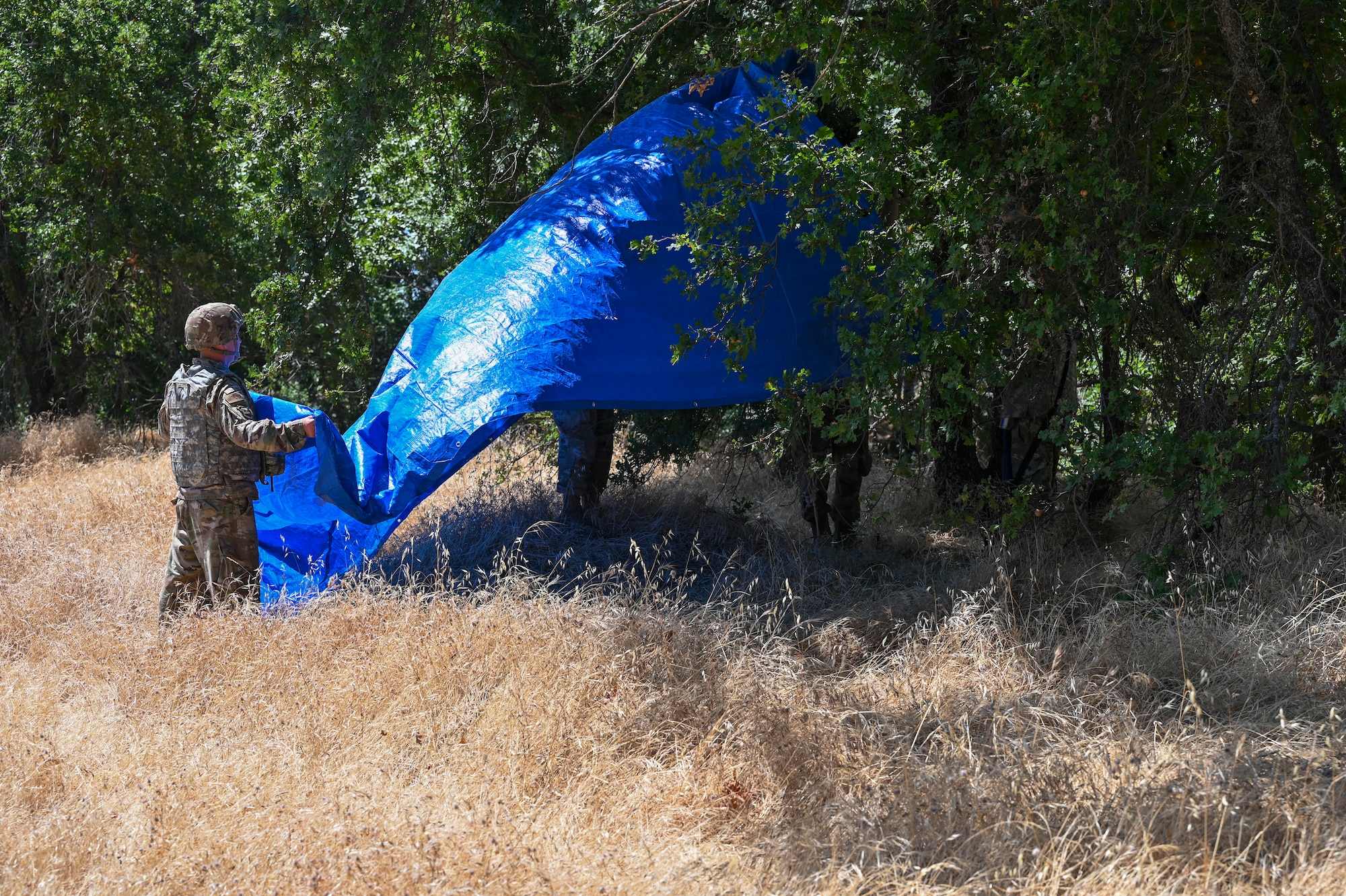 Airmen from the 9th Civil Engineer Squadron erect shelter during an exercise on Beale Air Force Base, California, July 17, 2025.