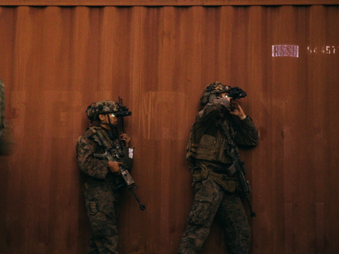 U.S. Marines with 2nd Battalion, 1st Marine Regiment, Marine Rotational Force – Darwin 25.3, take cover during the final event of Predator’s Run at Mount Bundey Training Area, Northern Territory, Australia, June 9, 2025.
