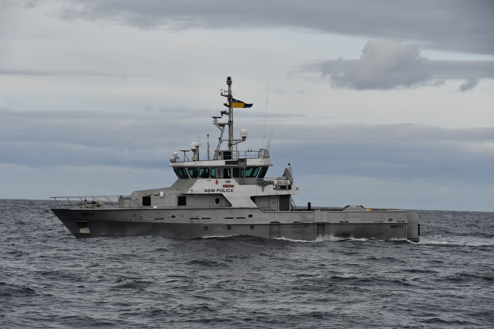Australian Fisheries Management Authority officers aboard the New South Wales Water Police vessel Nemesis patrol the Tasman Sea July 6, 2025. AFMA joined Pacific Quadrilateral Defence Coordination Group partners, France, New Zealand, and the U.S., during Operation Nasse, an annual multilateral fisheries monitoring, control and surveillance activity which detects, deters, and disrupts illegal, unreported, and unregulated fishing on the high seas of the Pacific Ocean. (U.S. Coast Guard photo, courtesy Australian Fisheries Management Authority)