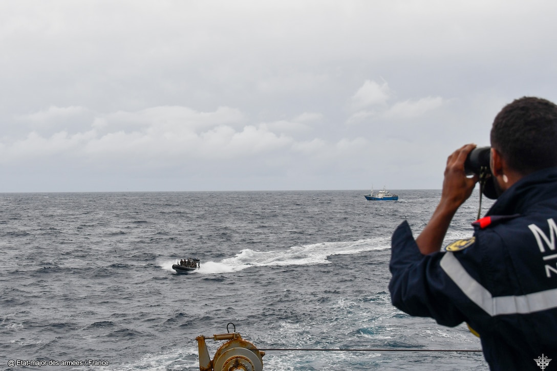 Officers with the French Armed Forces in New Caledonia prepare to board a commercial fishing vessel on the high seas in the Pacific Ocean June 20, 2025. FANC officers conducted fisheries inspections as part of Operation Nasse alongside medium endurance cutter USCGC Harriet Lane (WMEC 903), New South Wales Police vessel Nemesis, a P8-A from the Royal New Zealand Air Force, and a King Air airplane from the Pacific Islands Forum Fishing Agency. (U.S. Coast Guard photo, courtesy French Armed Forces in New Caledonia)