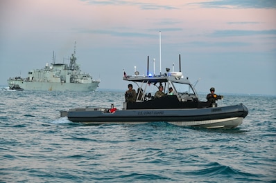 NORTHERN TERRITORY (July 20, 2025) — U.S. Coast Guard Port Security Unit 307 boat crew conduct seaward security for the Royal Canadian Navy HMCS Ville de Québec during Exercise Talisman Sabre 25 in Northern Territory, Australia, July 20, 2025....