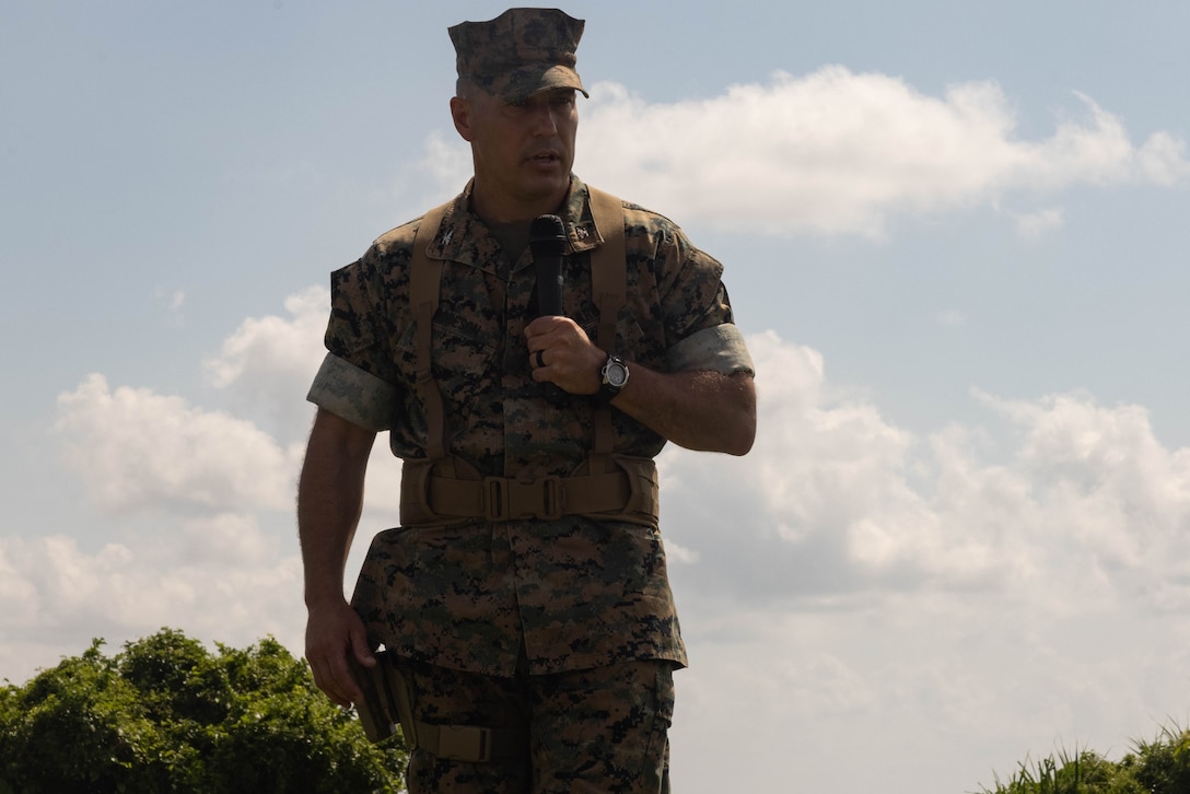 U.S. Marine Corps Col. Mastin M. Robeson Jr, oncoming commanding officer of Headquarters Battalion, 3d Marine Division, gives remarks during a change of command ceremony on Camp Courtney, Okinawa, Japan, July 2, 2025. The change of command ceremony signifies the transfer of command and responsibility of Headquarters Battalion, 3d Marine Division. Robeson is a native of South Carolina. (U.S. Marine Corps photo by Lance Cpl. Robert Blanks)