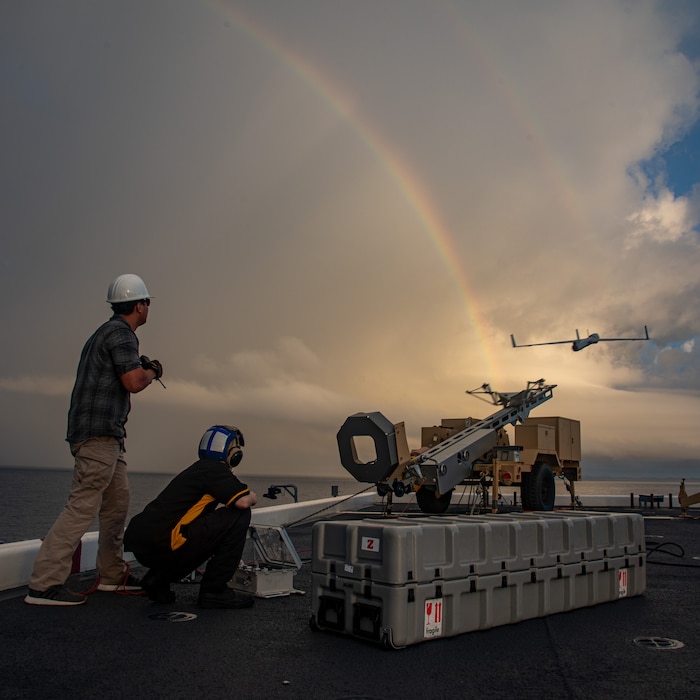 U.S. Military Sealift Command civil service mariner Abel Pardo and Culinary Specialist 3rd Class Kaitlynn Phillips, both assigned to the Lewis B. Puller-class expeditionary sea base USS John L. Canley (ESB 6) launch an Insitu Scan Eagle from the flight deck of the ship off the coast of Australia during Talisman Sabre, July 18, 2025.