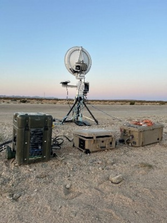 The U.S. Naval Research Laboratory (NRL) developed Hydrogen Small Unit Power (H-SUP) powering communications equipment during field testing at Marine Corps Air Ground Combat Center Twentynine Palms, Cali., May 19, 2025. The H-SUP system is a portable fuel cell electric generator with greater energy per weight than batteries and lower audible and thermal signatures than combustion generators.