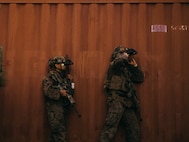 U.S. Marines with 2nd Battalion, 1st Marine Regiment, Marine Rotational Force – Darwin 25.3, take cover during the final event of Predator’s Run at Mount Bundey Training Area, Northern Territory, Australia, June 9, 2025.