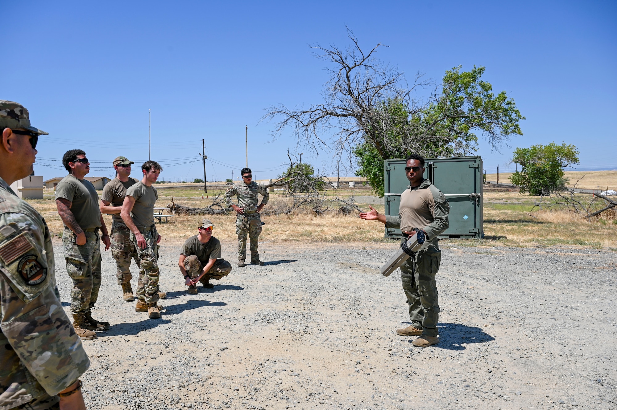 U.S. Air Force Airman from the 9th Security Forces Squadron, teaches a familiarization lesson during an exercise on Beale Air Force Base, California, July 17, 2025.