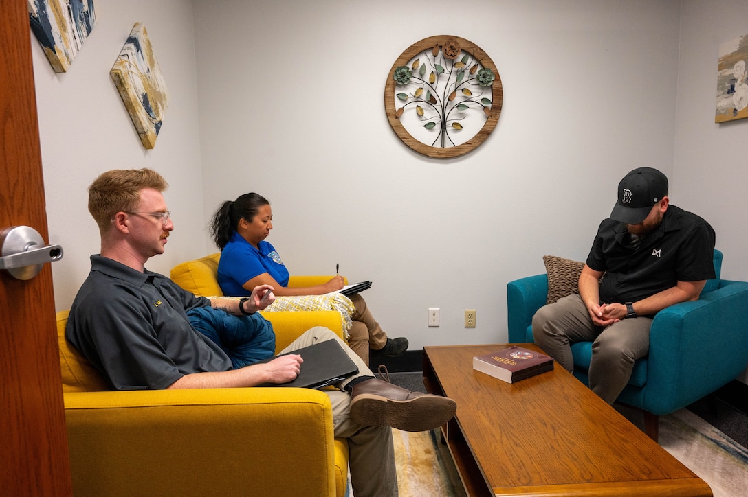 Special Agent Isaiah Moore, assigned to the Air Force Office of Special Investigations (AFOSI) Detachment 422, left, and Special Agent Katrina Cortez, assigned to Det. 422, interview a subject, right, at Altus Air Force Base, Oklahoma, July 22, 2025. The AFOSI mission is to identify, exploit and neutralize criminal, terrorist, and intelligence threats to the Department of the Air Force and the U.S. government. (U.S. Air Force photo by Senior Airman Kari Degraffenreed)