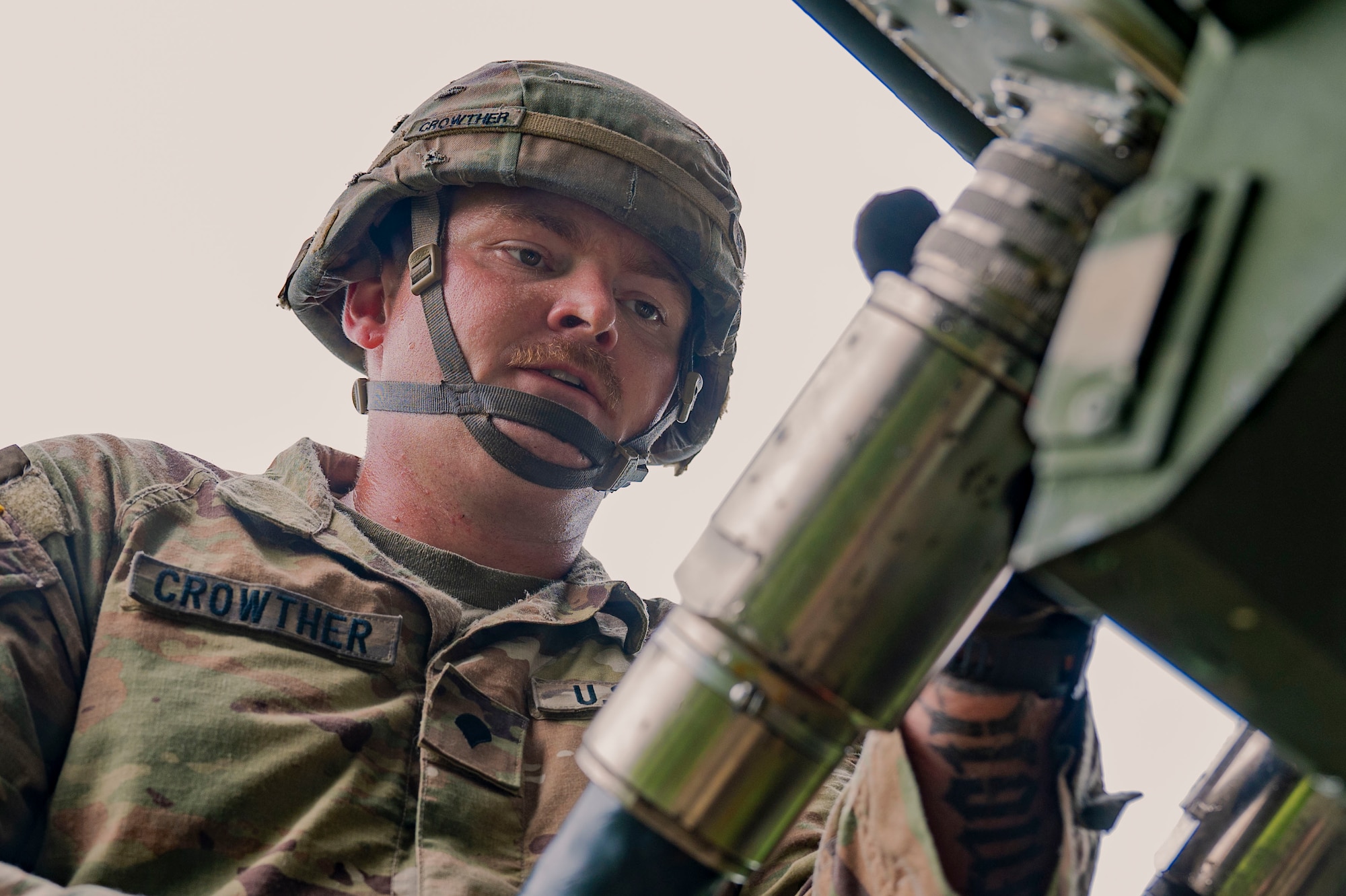 U.S. Army Spc. Dustin Crowther, 1-1 Air Defense Artillery engagement controller, secures a hose on an AN/MPQ-65 radar on Kadena Air Base, Japan, July 24, 2025.