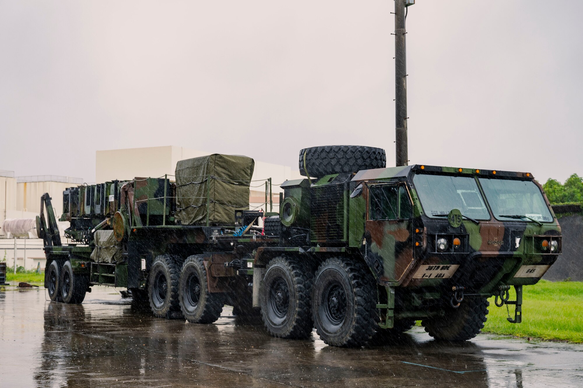 A U.S. Army Patriot missile battery assigned to the 1-1 Air Defense Artillery awaits activation during a rainstorm on Kadena Air Base, Japan, July 24, 2025.