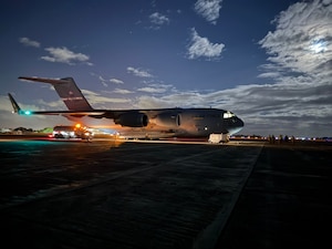 C-17 on flightline at night