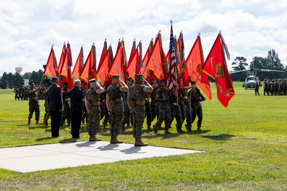 U.S. Marines assigned to II Marine Expeditionary Force perform a pass and review during a relief and appointment ceremony on Marine Corps Base Camp Lejeune, North Carolina, July 24, 2025. During the ceremony, U.S. Marine Corps Sgt. Maj. Anthony Loftus took over as the senior enlisted leader for II MEF from Sgt. Maj. David Wilson. Relief and appointment ceremonies are an integral part of the Marine Corps, signifying the transition of authority and responsibility between senior enlisted leaders. (U.S. Marine Corps photo by Sgt. Andrew King)