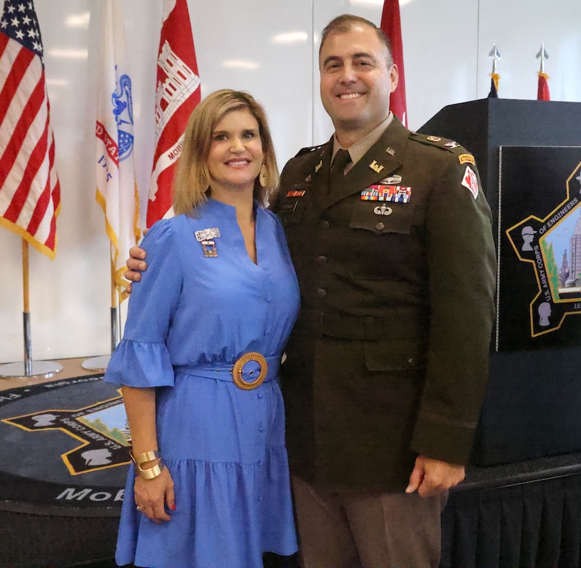 U.S. Army Corps of Engineers, Mobile District commander Col. Jeremy Chapman poses for a photo with his wife Renee Chapman at his retirement ceremony
