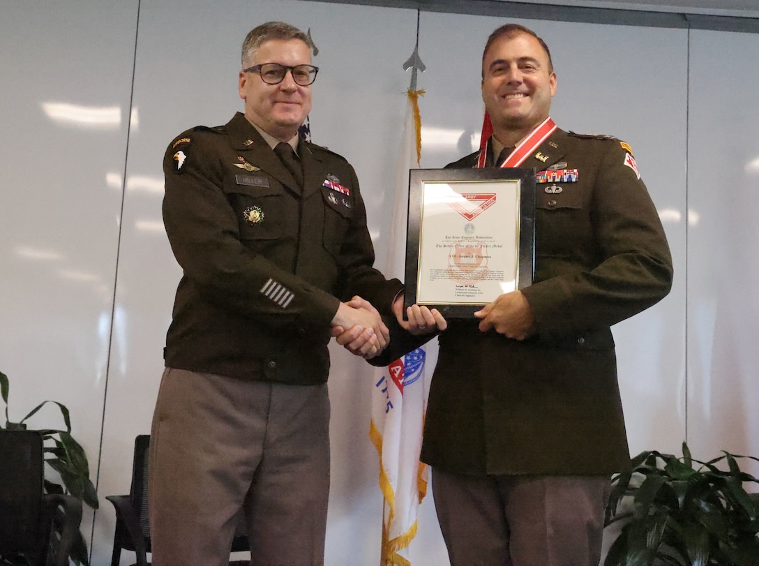 U.S. Army Corps of Engineers, Mobile District commander Col. Jeremy Chapman, right, receives the Silver de Fleury medal from Brigadier Gen. Zachary Miller, South Atlantic Division commander