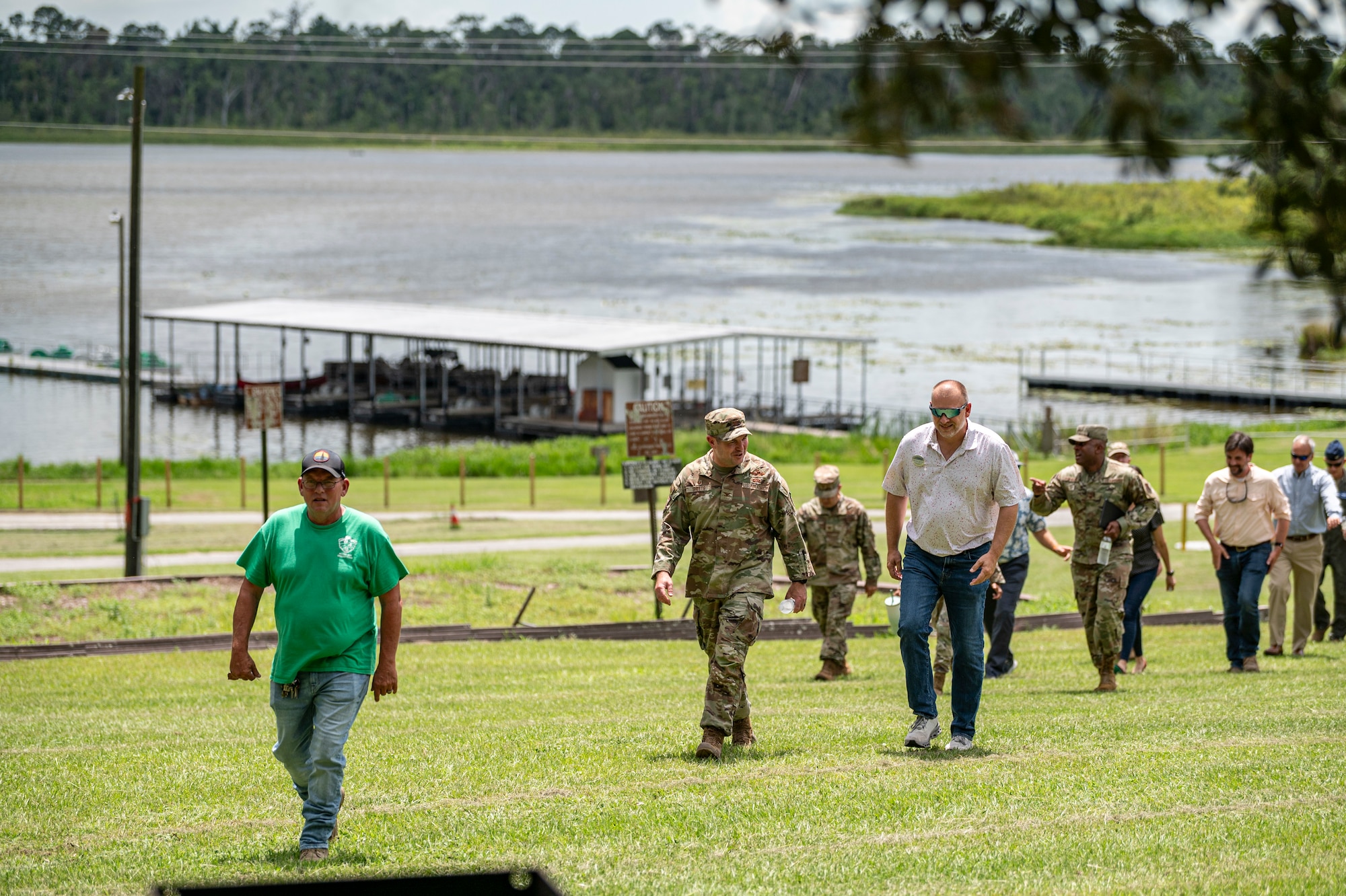Leadership from Moody Air Force Base, Georgia, receives a tour of Grassy Pond Recreation Area in Lake Park, Georgia, July 18, 2025. During the visit, they reviewed upgrades, including new cabins, repaired docks, and updated recreational areas. (U.S. Air Force photo by Senior Airman Leonid Soubbotine)