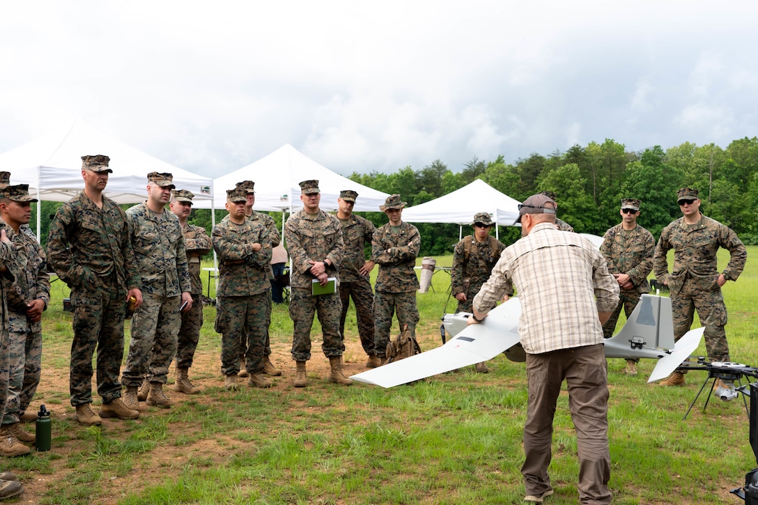 U.S. Marines with Marine Corps Advisor Company-A (MCAC-A) learn the capabilities and limitations of unmanned aerial systems (UAS) assets at Camp Upshur, Marine Corps Base Quantico, Va., May 15, 2025. Members of the Marine Corps Warfighting Laboratory support and educate MCAC-A Marines on UAS assets to increase their ability to advise and support foreign security forces. (U.S. Marine Corps photo by Connor Taggart)