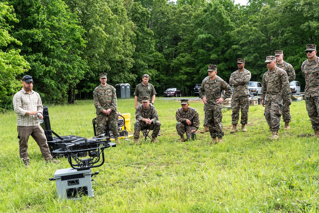 U.S. Marines with Marine Corps Advisor Company-A (MCAC-A) learn the capabilities and limitations of unmanned aerial systems (UAS) assets at Camp Upshur, Marine Corps Base Quantico, Va., May 15, 2025. Members of the Marine Corps Warfighting Laboratory support and educate MCAC-A Marines on UAS assets to increase their ability to advise and support foreign security forces. (U.S. Marine Corps photo by Connor Taggart)