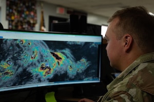 U.S. Air Force Airman 1st Class Nicholas Clark, 36th Operations Support Squadron weather apprentice and forecaster, observes cloud patterns using a Mark IV-B weather system to determine if a storm is forming during exercise Resolute Force Pacific 2025, at Andersen Air Force Base, Guam, July 25, 2025. REFORPAC, part of the first-in-a-generation Department-Level Exercise series, trains Airmen to operate in a contested, dynamic environment while executing real-time force projection and joint interoperability. (U.S. Air Force photo by Staff Sgt. Jasmine M. Barnes)