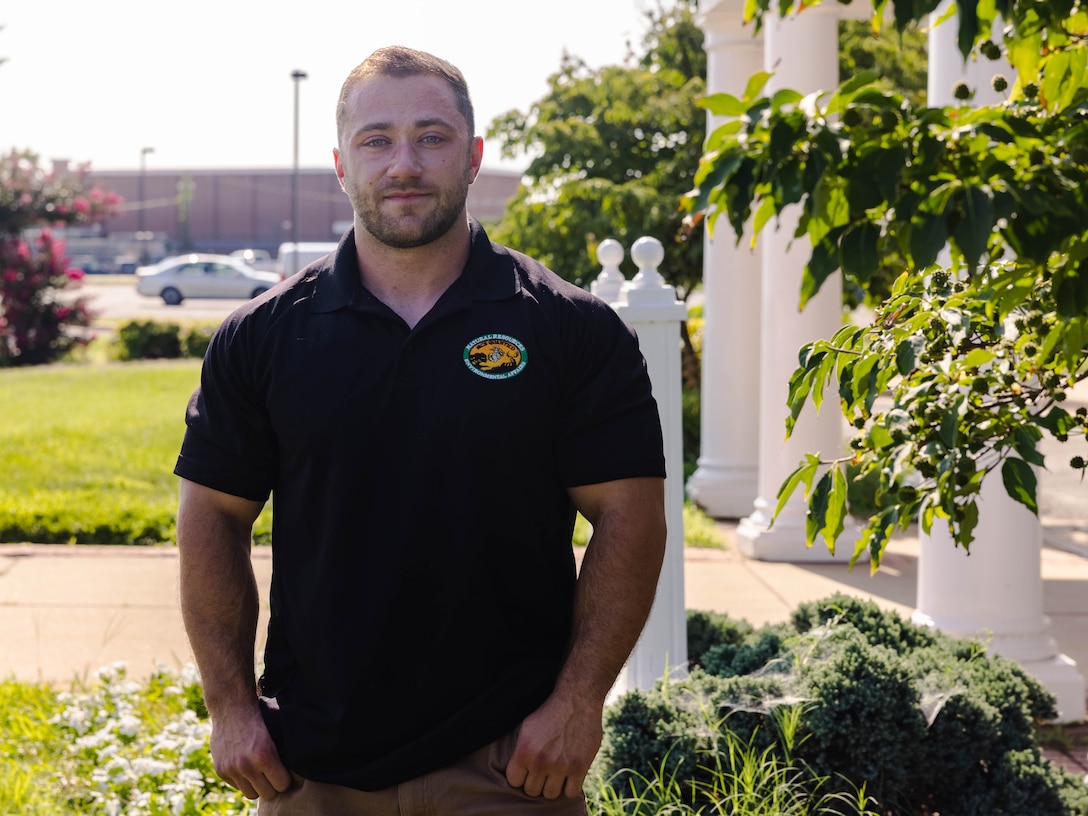 Michael Lewis, a hazardous waste disposer with the Natural Resources and Environmental Affairs office, poses for a photo outside of The Clubs at Quantico on Marine Corps Base Quantico, Virginia, July 24, 2025. Lewis won Junior Civilian of the Quarter Award for his work that generated over half a million dollars in revenue from the base’s Recycling Facility Program. (U.S. Marine Corps photo by Lance Cpl. David Brandes)