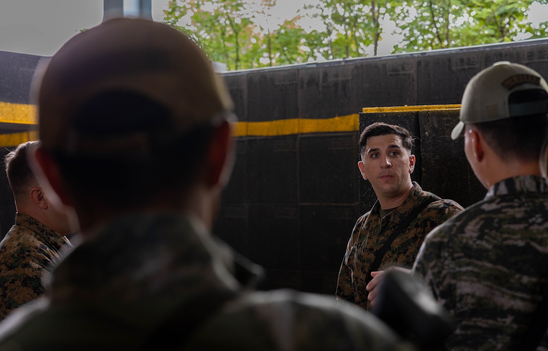 U.S. Marine Corps Gunnery Sgt. Jakob Castaneda, the operations chief with Golf Company, 2nd Battalion 23rd Marines, forward deployed with 4th Marine Regiment, 3d Marine Division as part of the Unit Deployment Program, teaches a class about U.S. Marine Corps military operations in urban terrain techniques for Republic of Korea Marines with 1st Marine Division, ROK, during the Korean Marine Exercise Program 25.2 in Pohang, South Korea, July 17, 2025. KMEP is conducted regularly between the ROK and U.S. Marine Corps to increase their combined capabilities through realistic training geared towards deterring threats and maintaining peace in the Indo-Pacific. Castaneda is a native of California. (U.S. Marine Corps photo by Cpl. Kanoa Thomas)