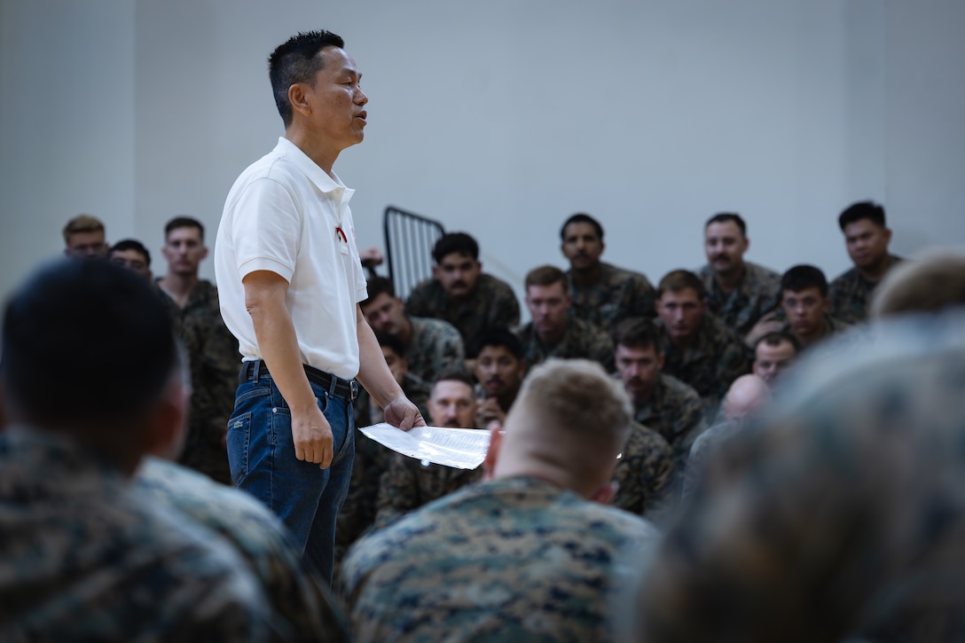 Mr. Pyong-Yol Kim welcomes U.S. Marines with 2nd Battalion, 23rd Marines, forward deployed with 4th Marine Regiment, 3d Marine Division as part of the Unit Deployment Program, after they arrive and offload gear during the Korean Marine Exercise Program 25.2 at Camp Mujuk, South Korea, July 16, 2025. KMEP is a semi-annual exercise that provides iterative opportunities for Republic of Korea Marine Corps and U.S. Marine Corps units to train together, improving their combined capabilities to deter threats and maintain peace on the Korean Peninsula. (U.S. Marine Corps photo by Lance Cpl. Van Hoang)
