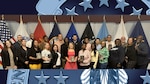 A group of people pose for a picture.