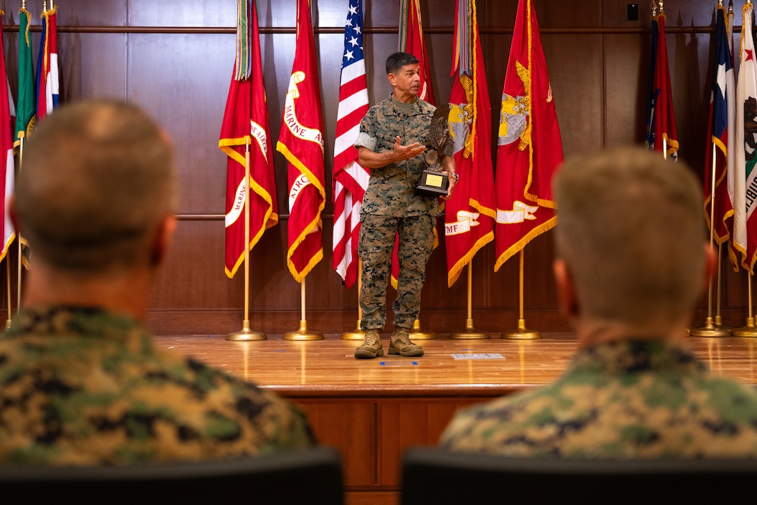 U.S. Marine Corps Maj. Gen. John Kelliher III, commanding general of 4th Marine Aircraft Wing, addresses the audience after receiving the Admiral James S. Russell Naval Aviation Flight Safety Award for 2024 at Marine Corps Support Facility, New Orleans, Louisiana, July 24, 2025. The award recognizes the safety and mishap prevention practices that is cultured within military units while still effectively conducting flight operations. (U.S. Marine Corps photo by Cpl. Ujian Gosun)