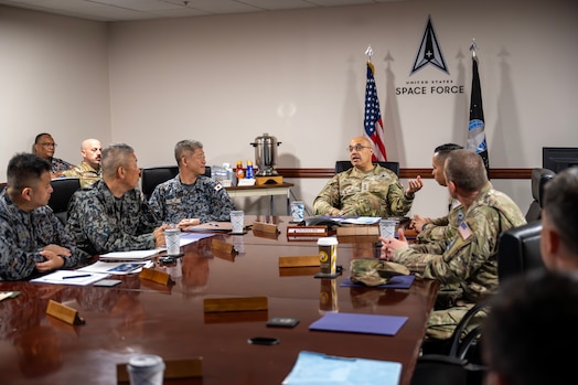  U.S. Space Force Lt. Gen. David N. Miller, Jr., commander of Space Operations Command (head of table), meets with 20th Space Surveillance Squadron (20 SPSS) Guardians and members of the Japan Air Self-Defense Force (JASDF) Space Operations Group at Eglin Air Force Base, Fla., June 26th, 2025
