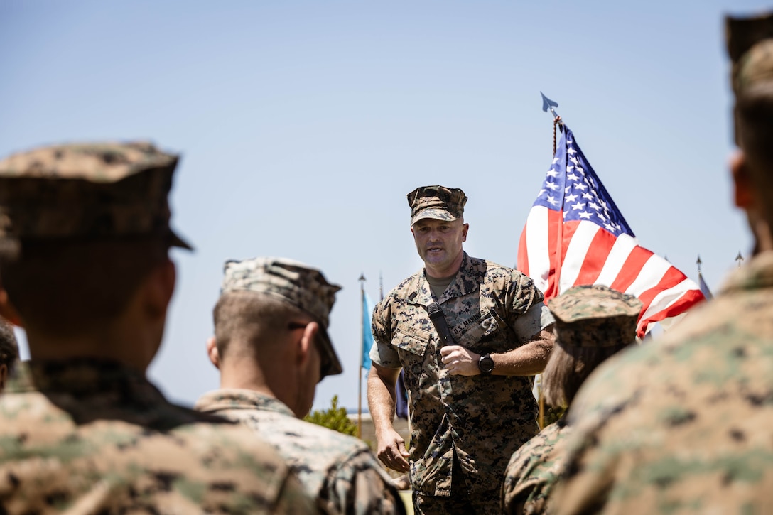 U.S. Marine Corps Sgt. Maj. Trevor Goff, the outgoing command senior enlisted leader of I Marine Expeditionary Force Support Battalion, I Marine Expeditionary Force Information Group, delivers remarks during a relief and appointment ceremony at Marine Corps Base Camp Pendleton, California, July 23, 2025. The relief and appointment ceremony signifies the transfer of responsibility and authority  from the outgoing to incoming command senior enlisted leader. (U.S. Marine Corps photo by Cpl. Peyton Kahle)