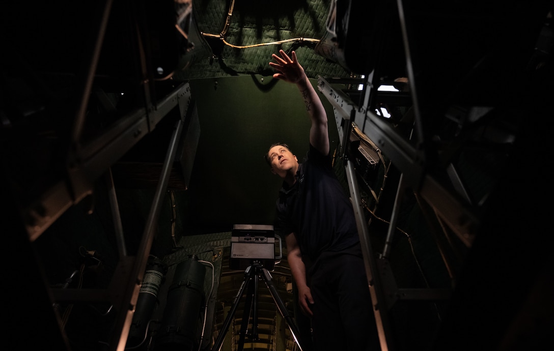 Earl Bagwell, 316th Wing  SparkX Cell Innovation and Idea Center innovation officer, captures a 3D scan of the inside of a historic B-17G Flying Fortress in the Air Mobility Command Museum at Dover Air Force Base, Del., June 4, 2025.