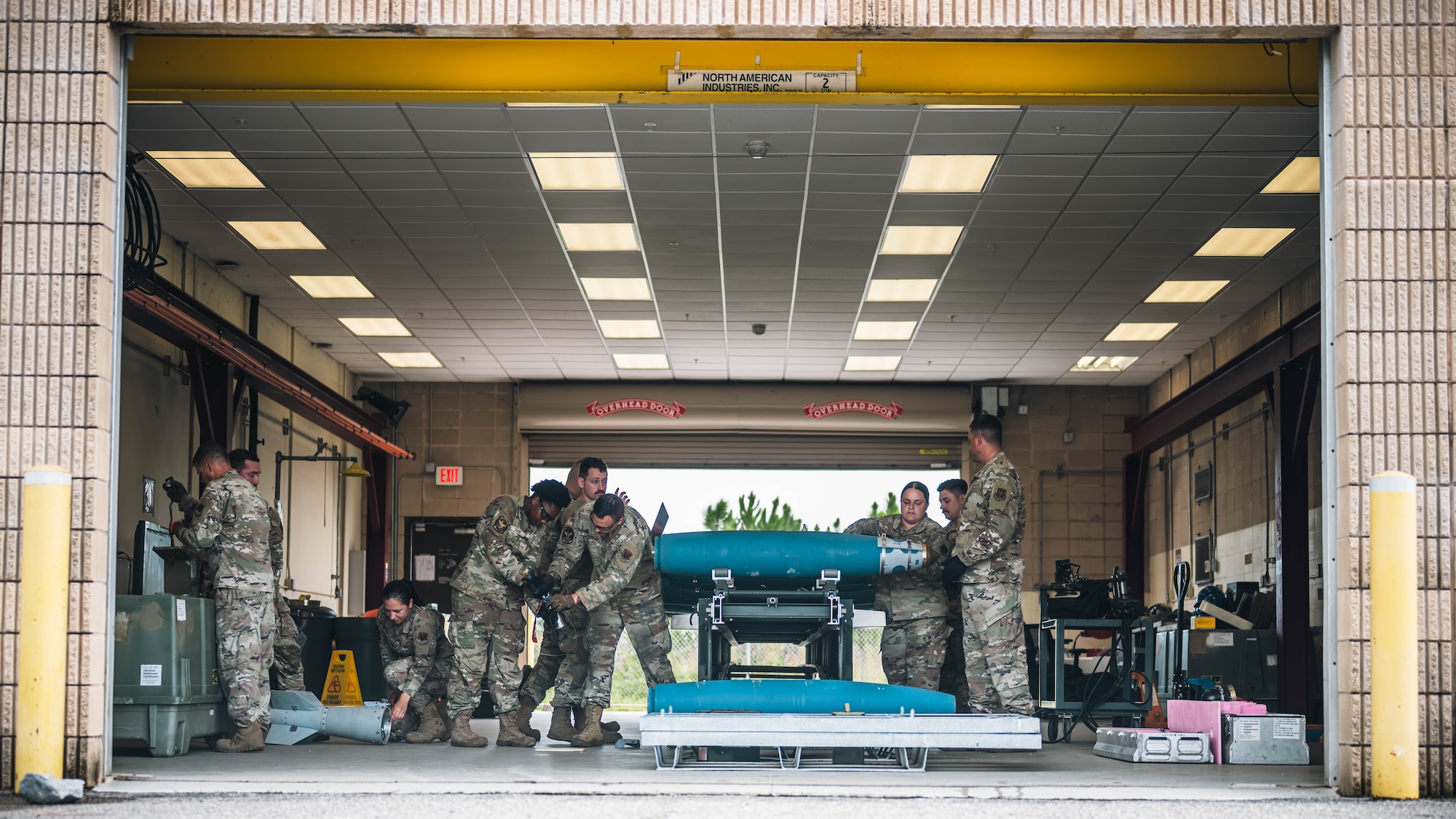 Airmen assemble munitions