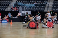 U.S. Army Capt. Samantha Frey attempts to catch a pass during the wheelchair rugby event at the 2025 Department of Defense Warrior Games at Ed Robson Arena in Colorado Springs, Colorado, July 22, 2025.