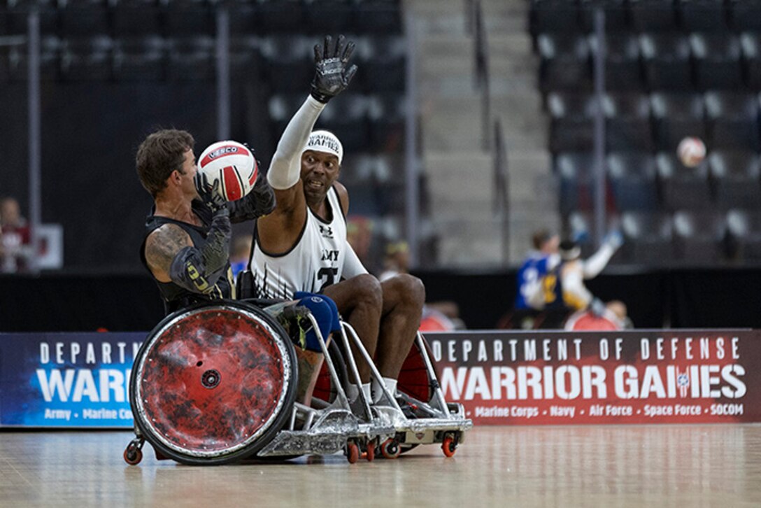 U.S. Army Staff Sgt. Derrick Thompson plays defense in the wheelchair rugby match against Team SOCOM during the 2025 Department of Defense Warrior Games at Colorado Springs, Colorado, July 22, 2025.