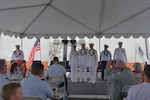 Capt. Dorothy Hernaez (left), Rear Adm. Jeffrey Novak (middle), and Capt. Brian Krautler (right) stand alongside each other on the U.S. Coast Guard Cutter Stratton (WMSL 752) having completed the change of command ceremony while moored at Base Honolulu, July 22, 2025. Commissioned in 2012, Stratton is one of ten legend-class National Security Cutters and one of four homeported in Alameda, California. (U.S. Coast Guard photo by Ensign Sarah Choe)