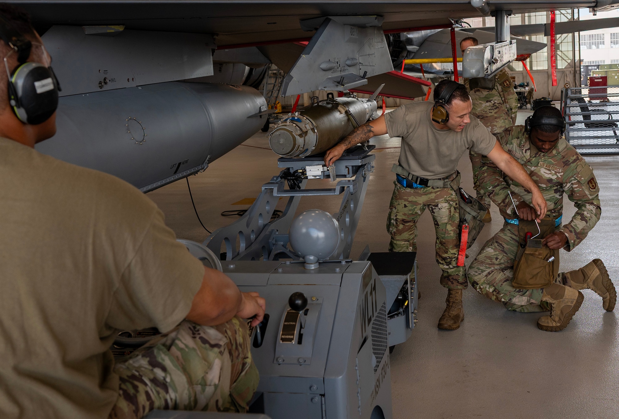 Airmen battle in weapons load competition.