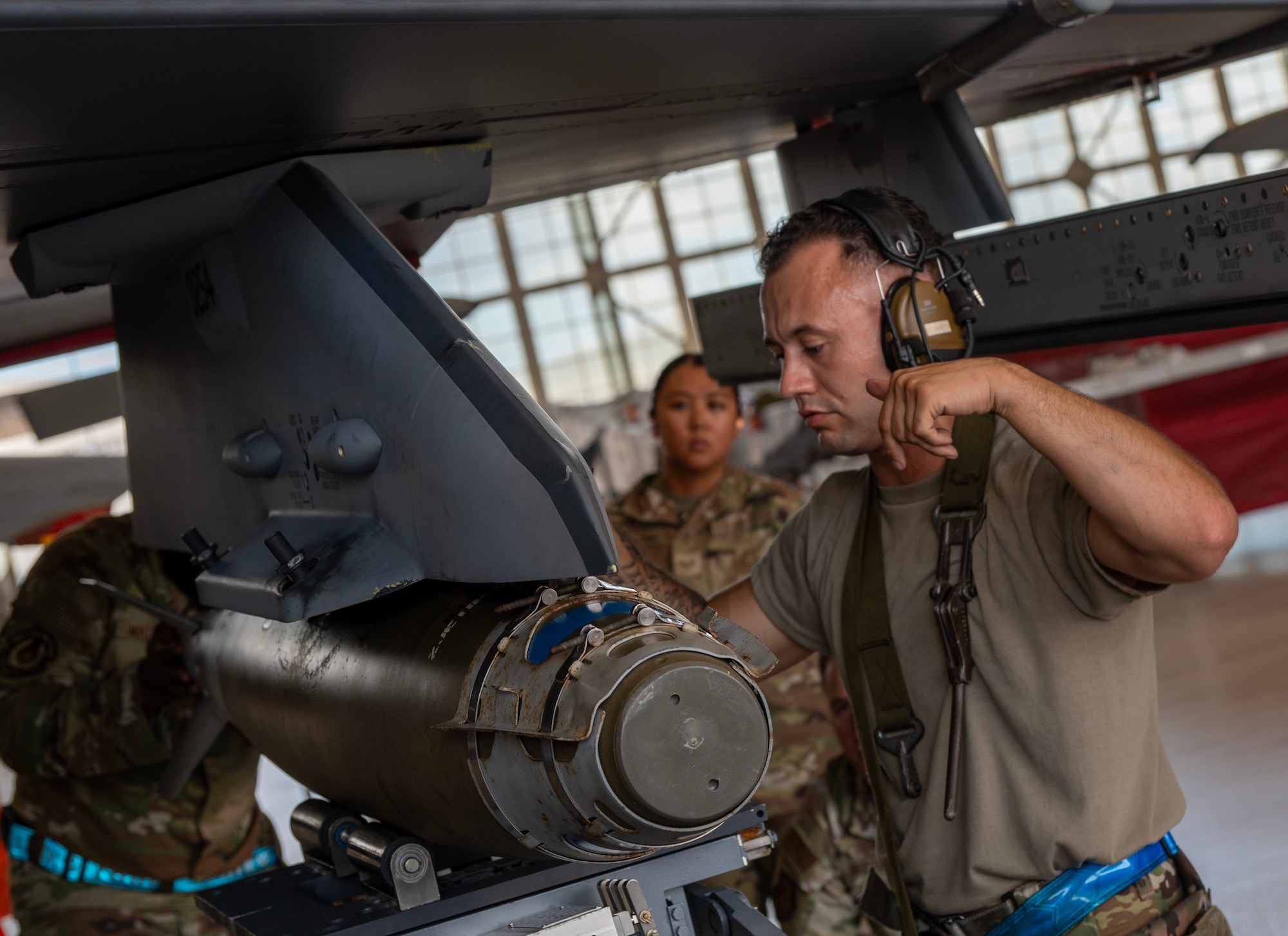 Airmen battle in weapons load competition.