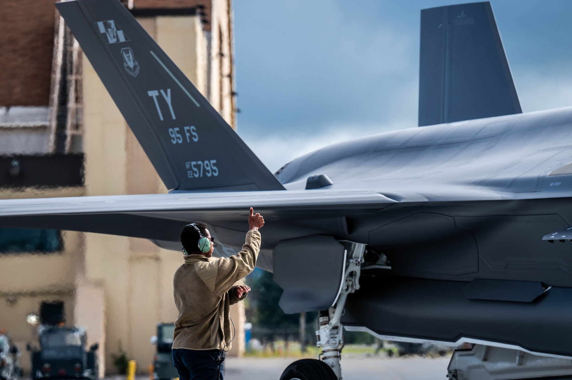U.S. Air Force Airman 1st Class Justin Garrett, 95th Fighter Generation Squadron crew chief, performs pre-flight checks on a F-35A Lightning II during Red Flag-Alaska 25-3 at Eielson Air Force Base, Alaska, July 25, 2025.
