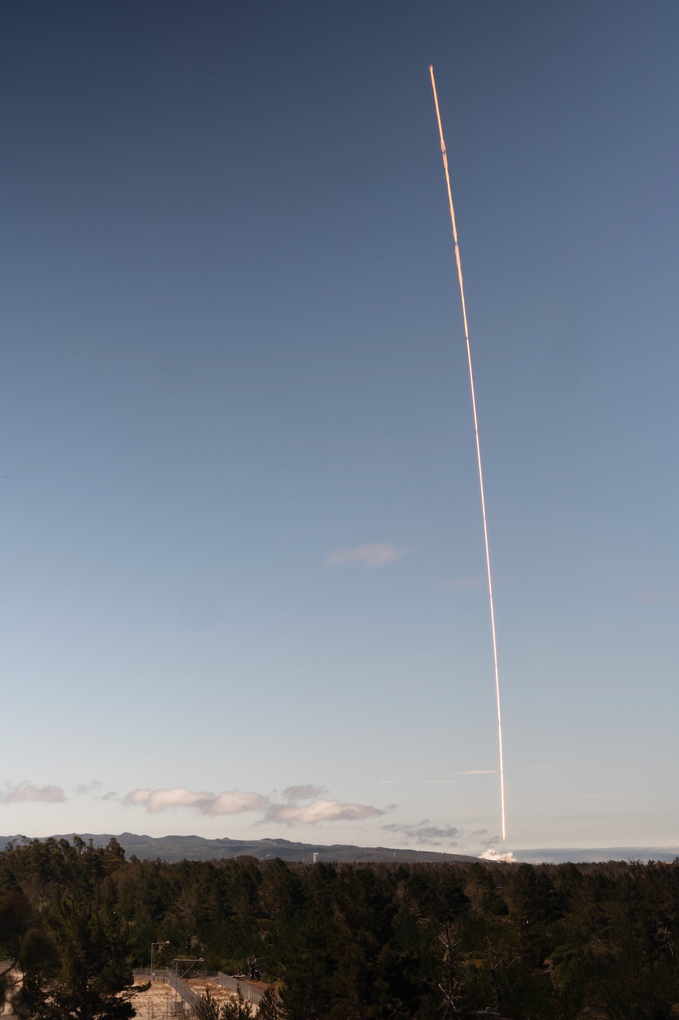 A rocket launches outside.
