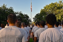 Airmen stand in formation prior to a wing run.